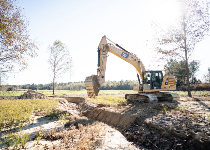 Cat Bulldozer Moving Dirt At Job Site